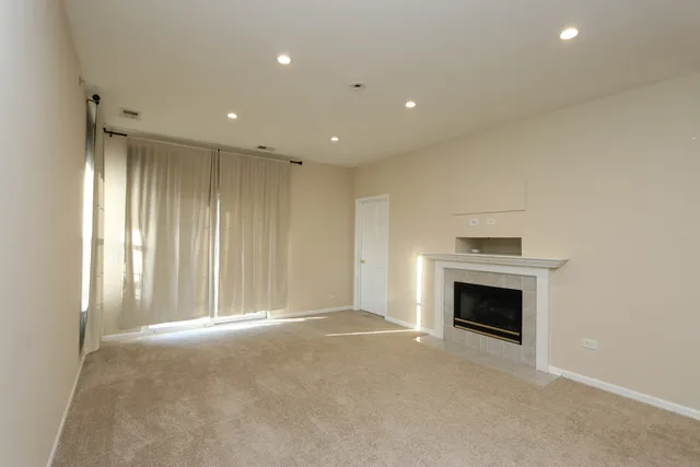 a view of livingroom and fireplace