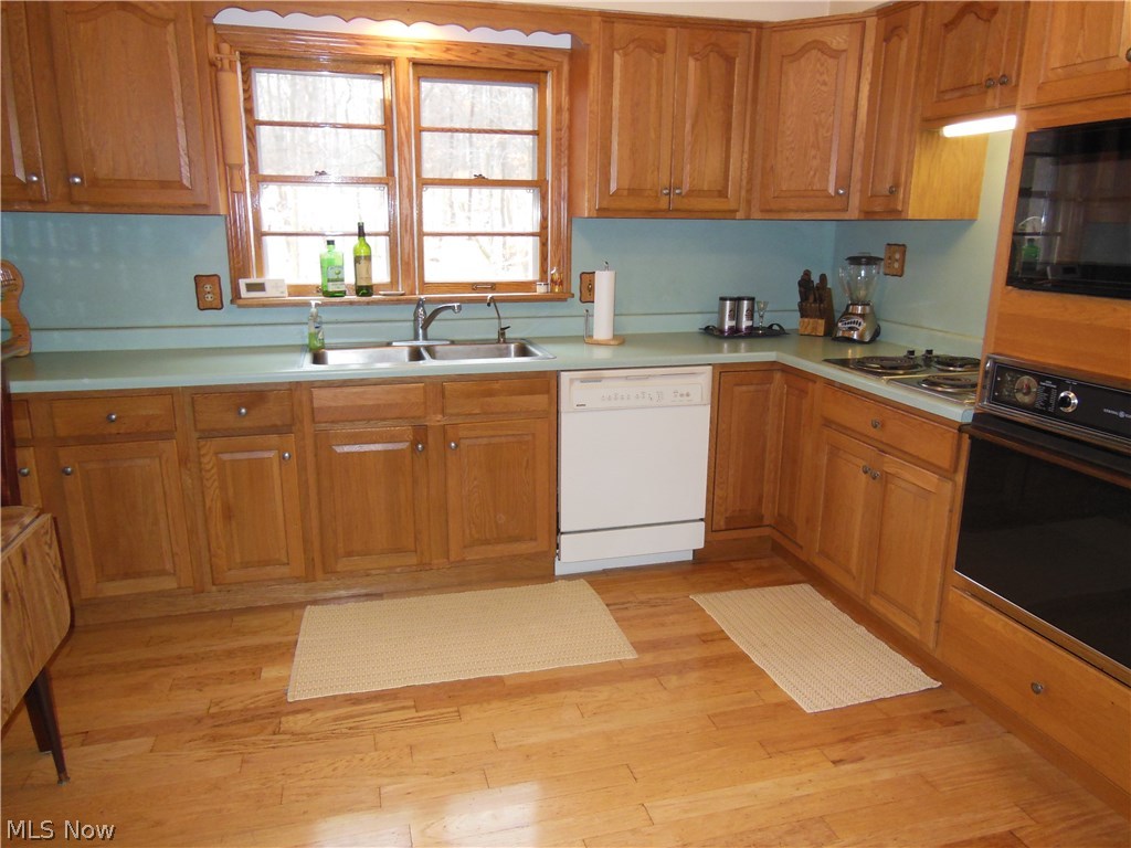11597 Sperry Road Chesterland, OH 44026 - Photo 12 of 25 Lots of Cupboards, Countertop Range, Wall Oven & Microwave ... Large Dining Area Just Outside of the Kitchen!