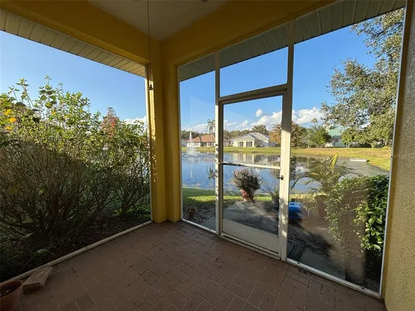 a view of a glass door and an outdoor space