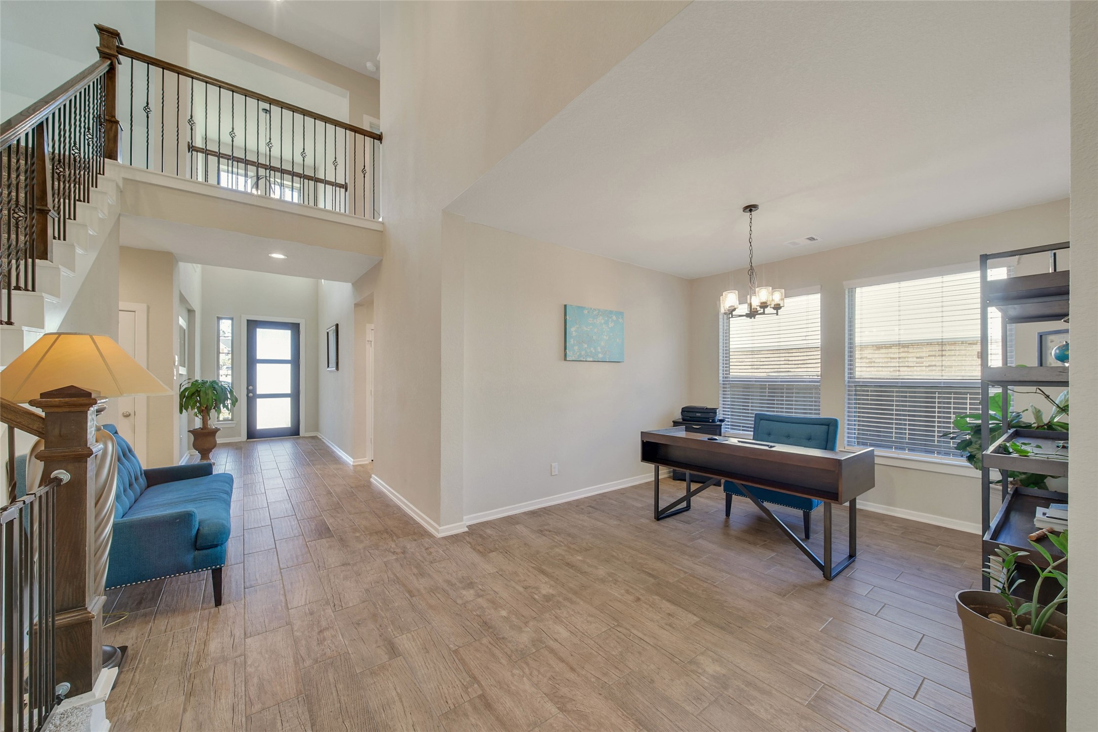 128 Yellow Perch Way Willis, TX 77318 - Photo 11 of 32 a living room with furniture and a large window