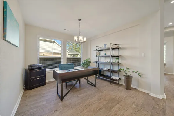 a room with furniture a window and a table