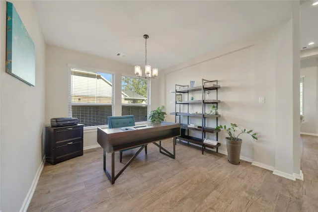 a room with furniture a window and a table