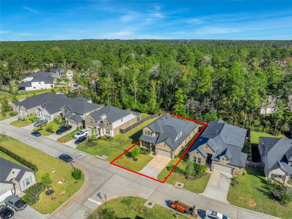 an aerial view of a house with a garden