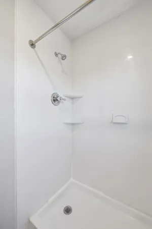 a bathroom with a bath tub