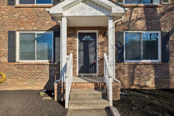 a front view of a house with an empty space
