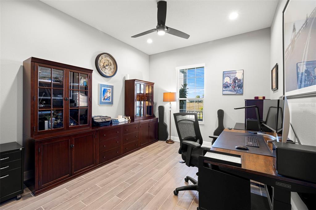 14375 Skipping Stone Loop Parrish, FL 34219 - Photo 32 of 87 a view of a workspace with furniture and a window