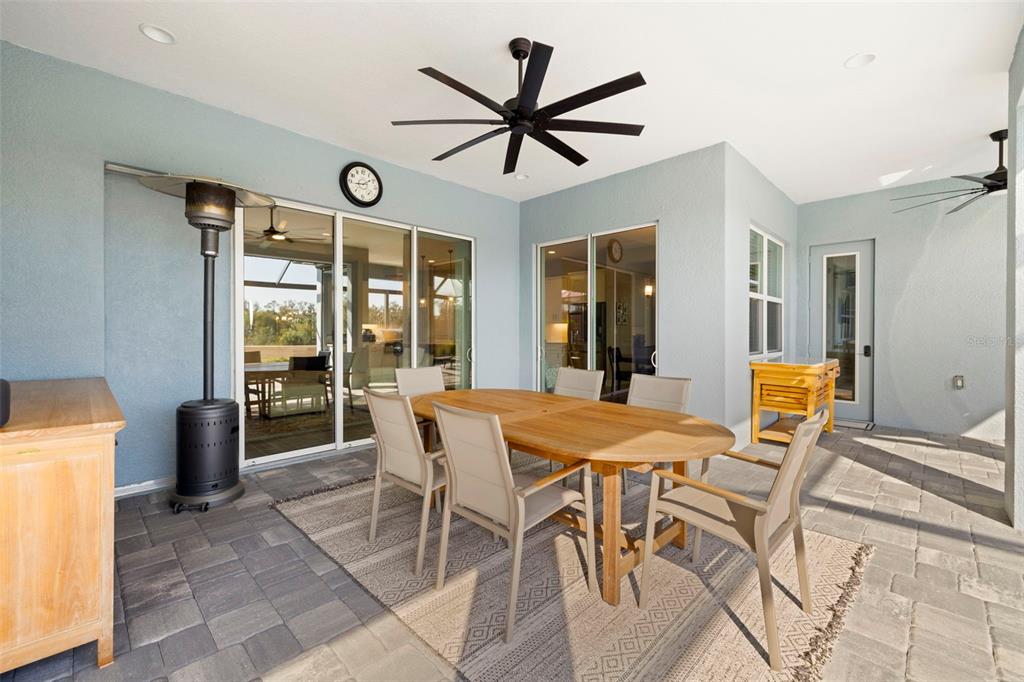 14375 Skipping Stone Loop Parrish, FL 34219 - Photo 47 of 87 a view of a dining room with furniture and a chandelier