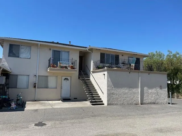 a front view of a house with a garage