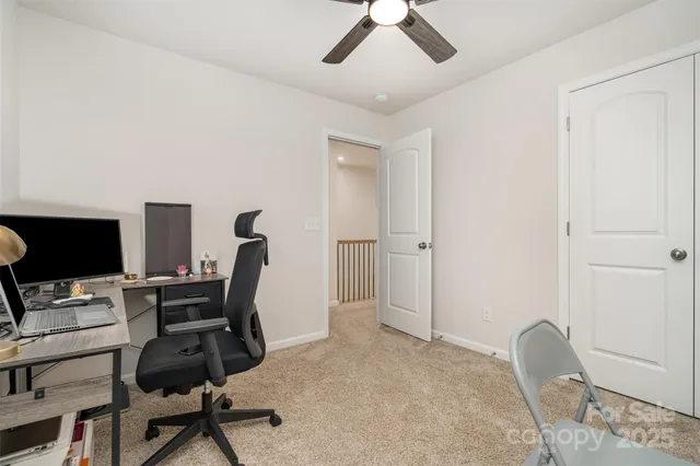 a bedroom with a bed and a cabinets