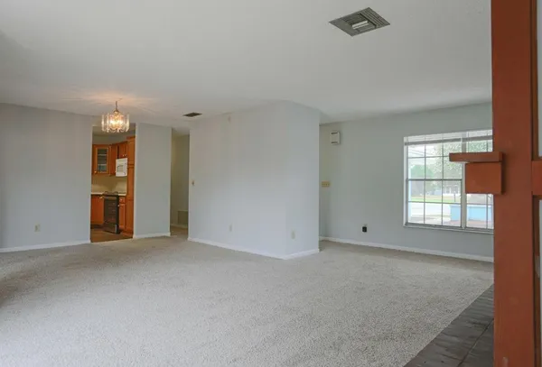 an empty room with window