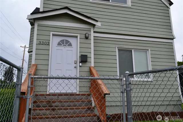 a front view of a house with a door
