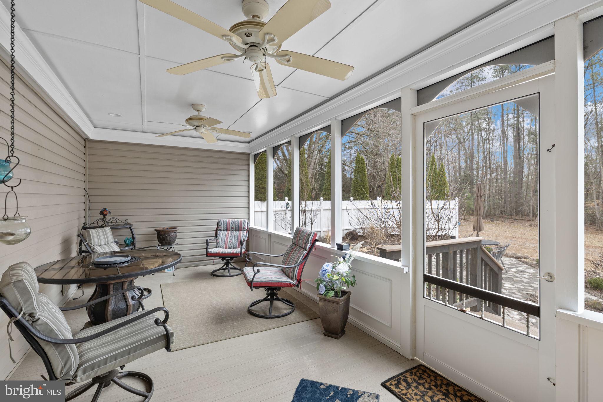 54 Hudson Road Fredericksburg, VA 22405 - Photo 22 of 59 Screened side deck, seating area and ceiling fans