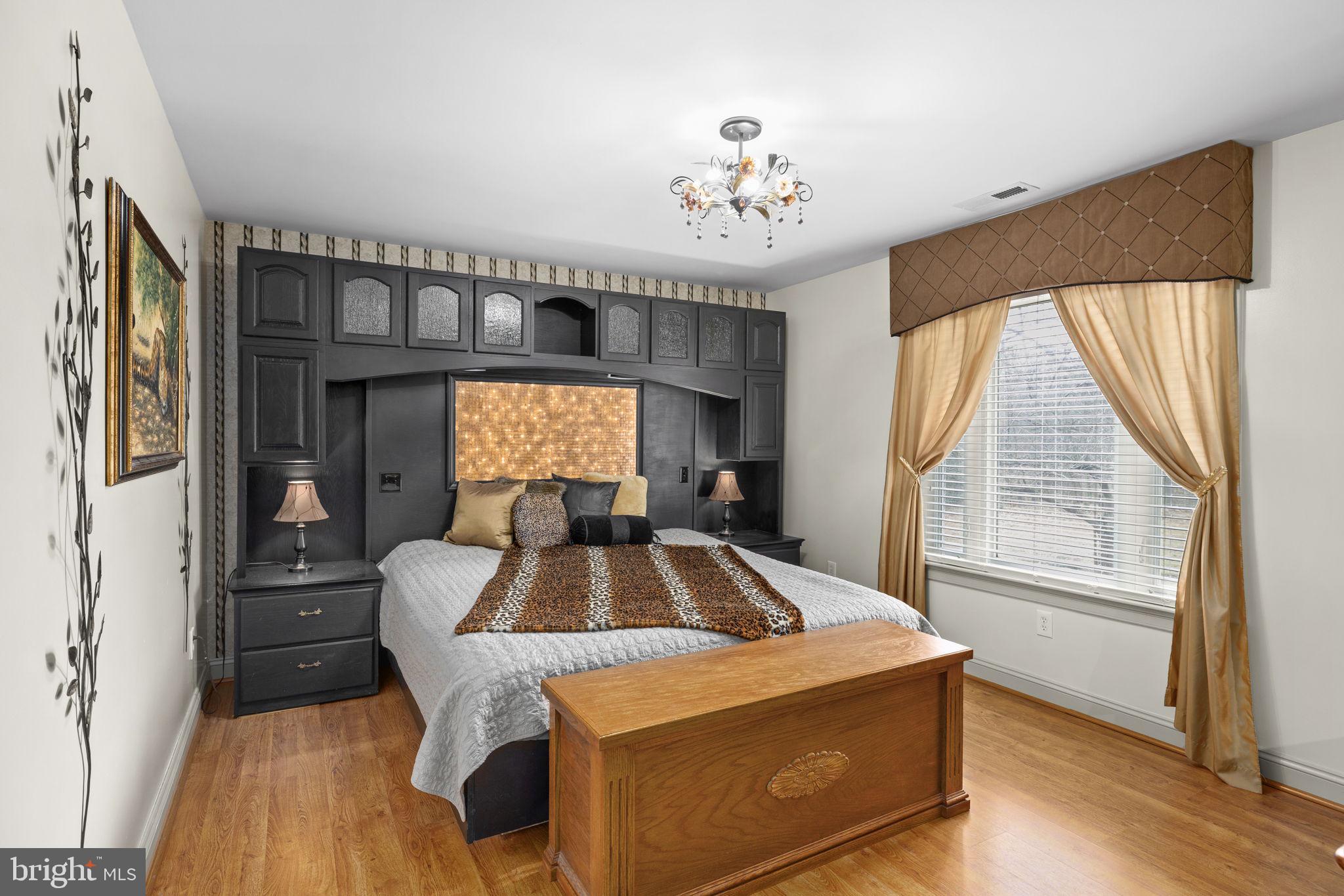 54 Hudson Road Fredericksburg, VA 22405 - Photo 23 of 59 Primary bedroom with built-in headboard wall