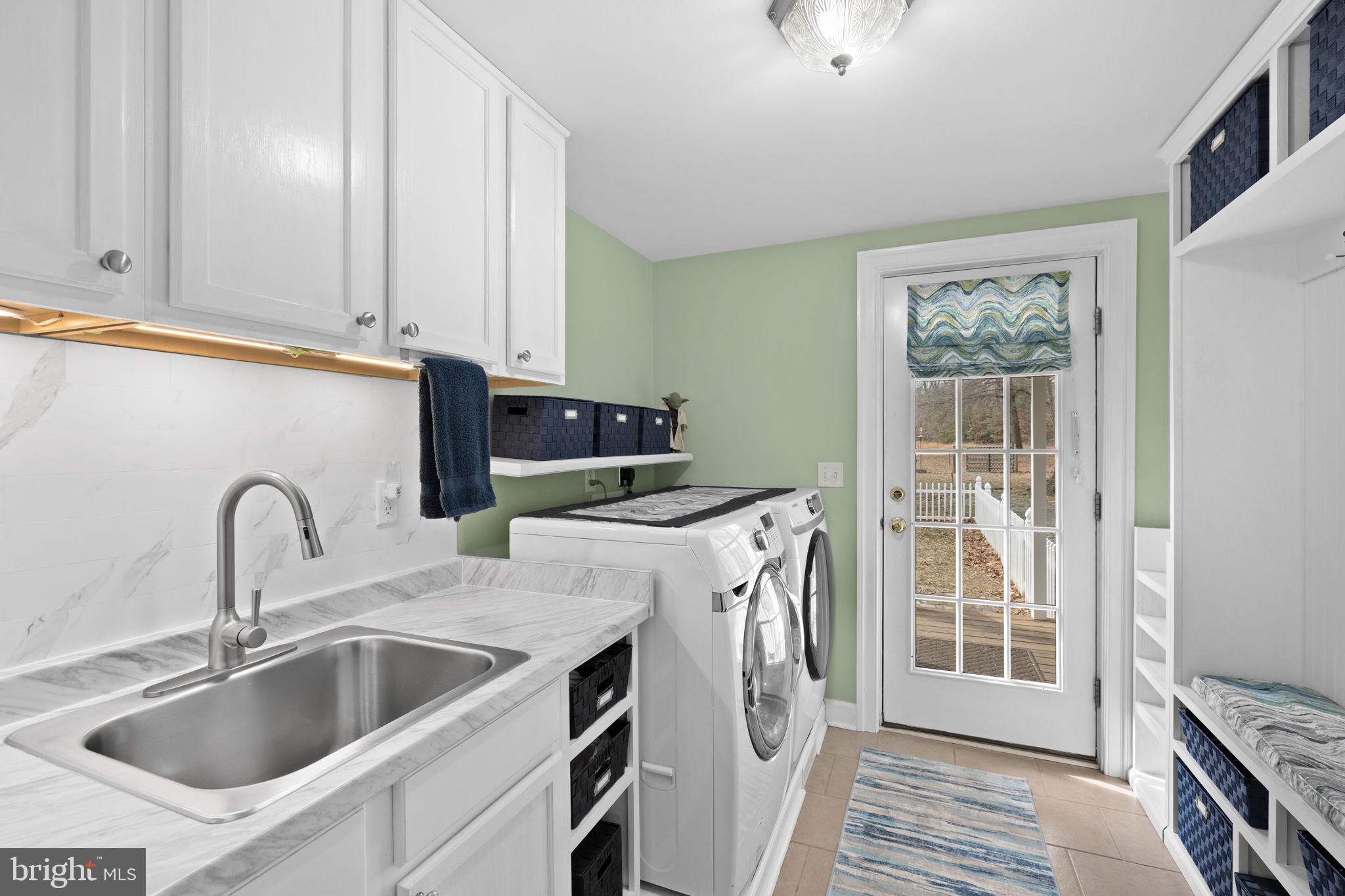 54 Hudson Road Fredericksburg, VA 22405 - Photo 31 of 59 Gorgeous laundry room with sink and storage