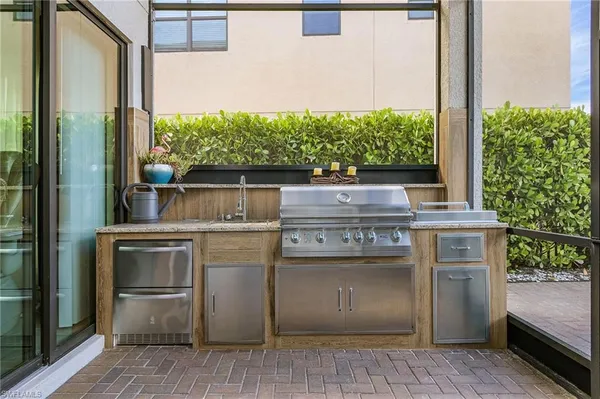 a kitchen with a stove and a microwave