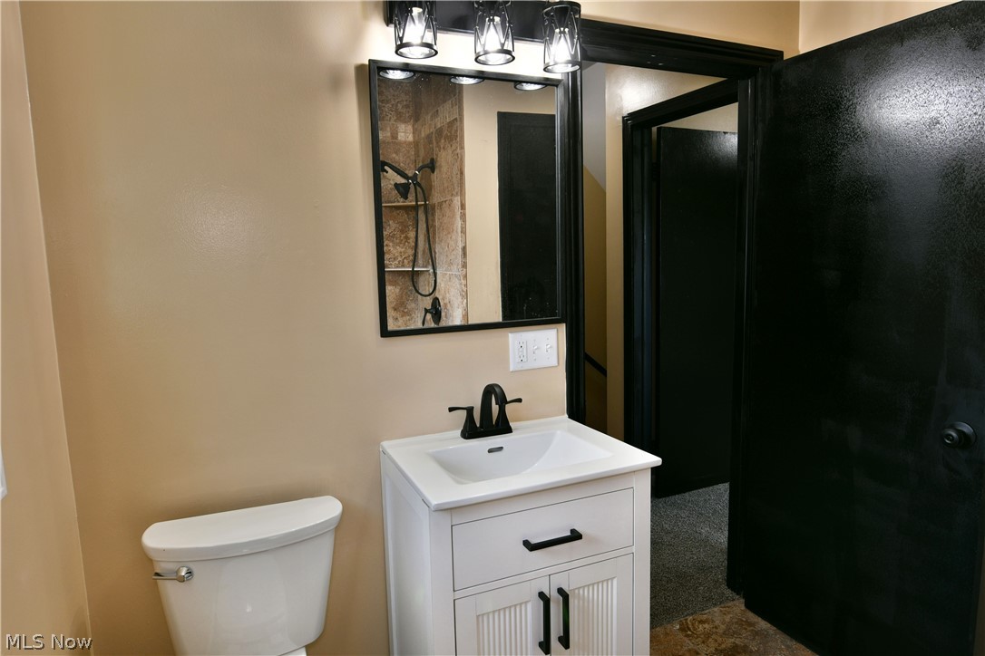 105 Fairview Avenue Cortland, OH 44410 - Photo 38 of 47 Bathroom featuring vanity and toilet