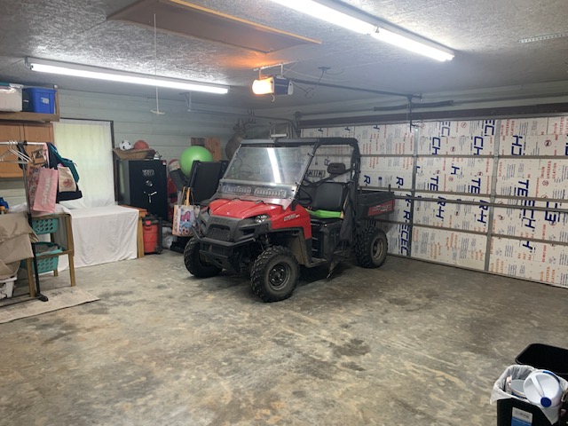 2026 Dry Creek Road St. Joe, AR 72675 - Photo 35 of 60 Concrete flooring with overhead fluorescent lighting