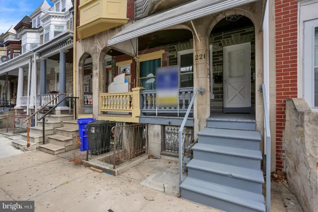 a view of entryway with stairs and wooden floor