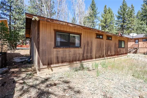 a front view of a house with a patio