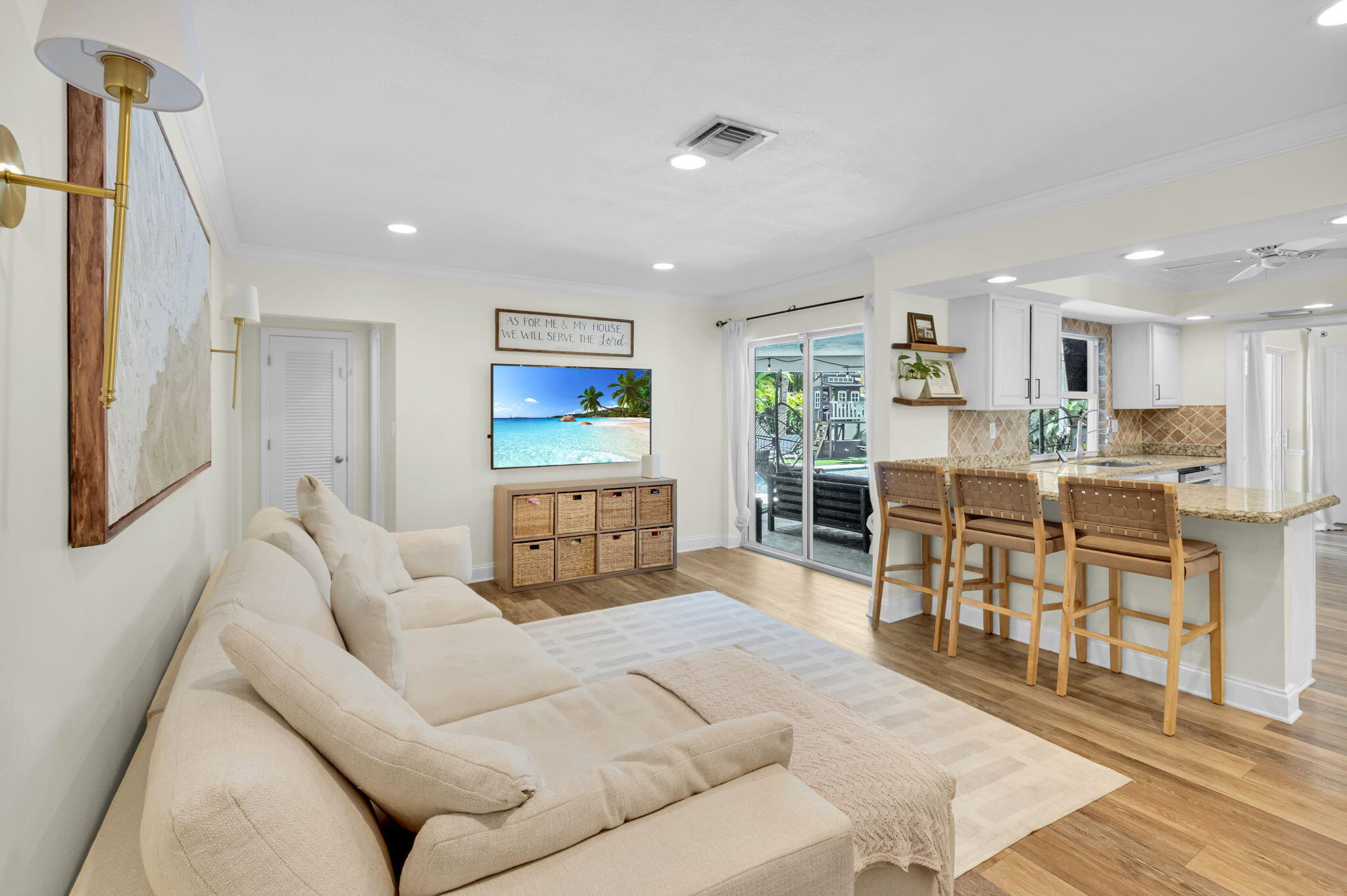 769 Berkley Street Boca Raton, FL 33487 - Photo 13 of 106 a living room with furniture and a wooden floor