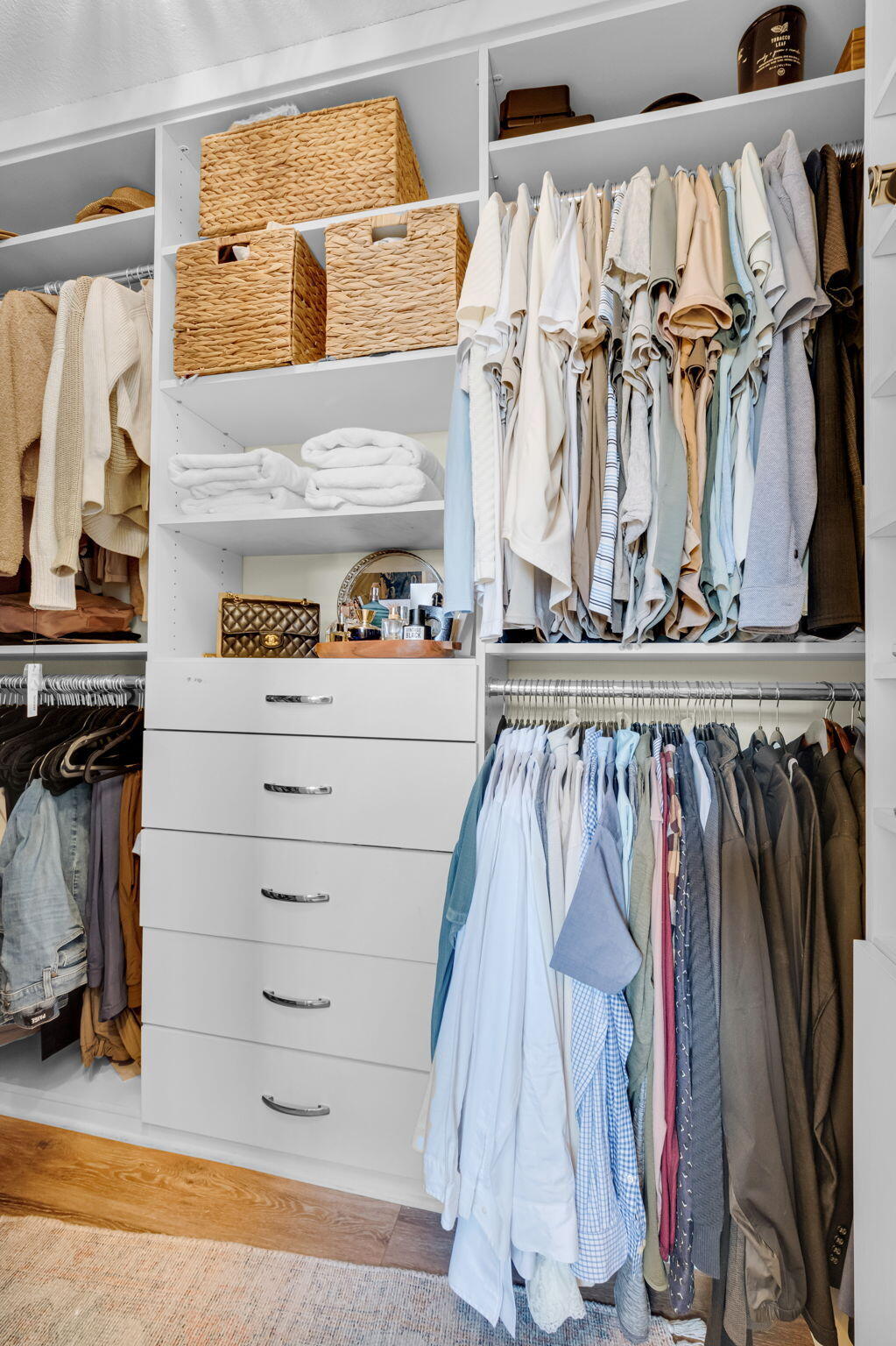 769 Berkley Street Boca Raton, FL 33487 - Photo 34 of 106 a view of walk in closet with clothes and shoes