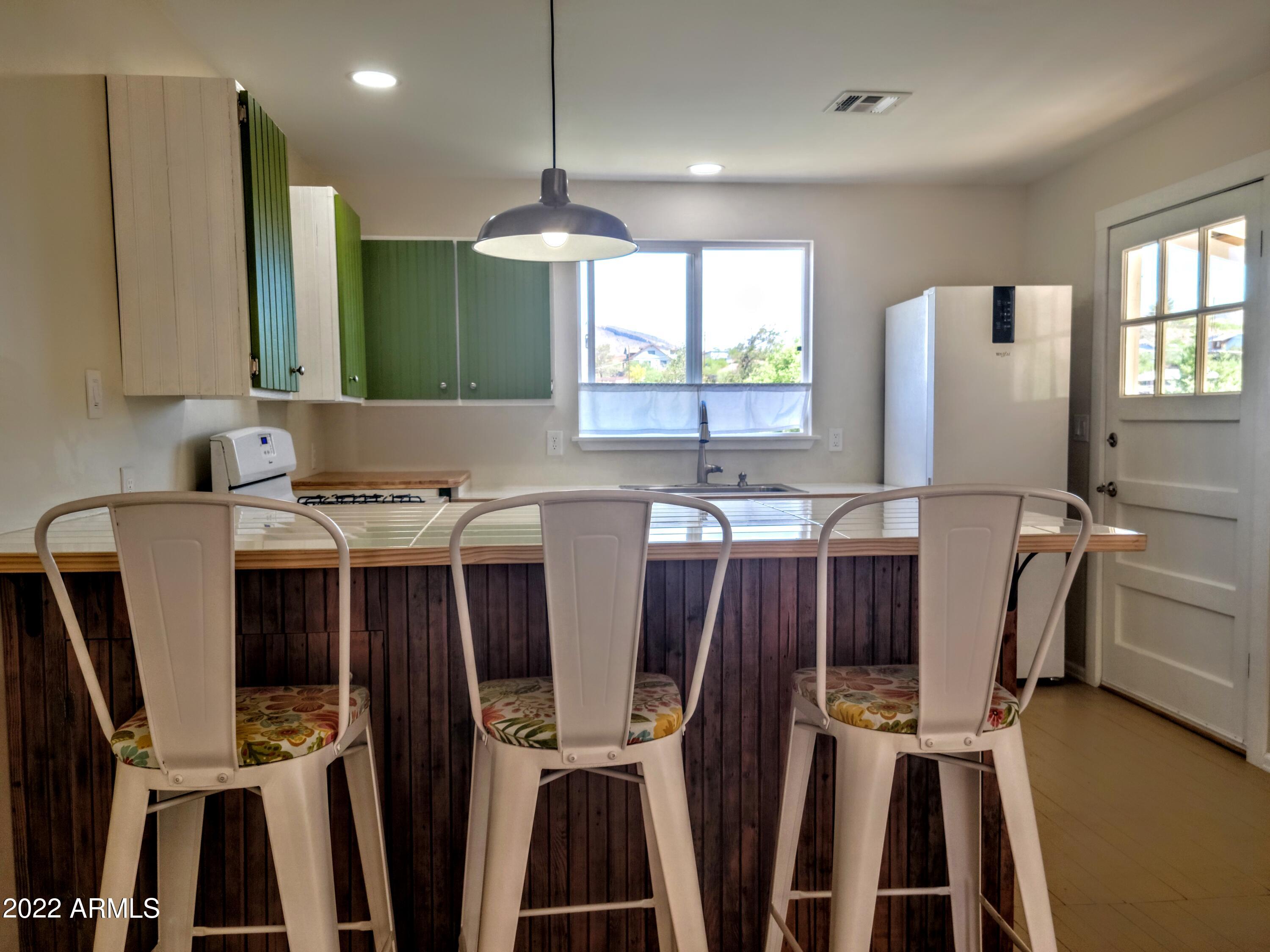 227 Adsit Street Bisbee, AZ 85603 - Photo 5 of 22 20220528_085521