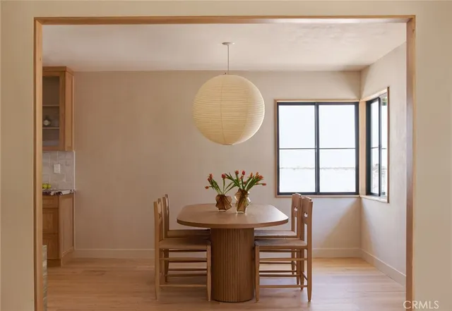 a kitchen with stove and cabinets