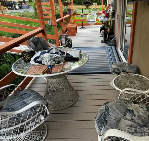 a picture of water heater room with wooden floor