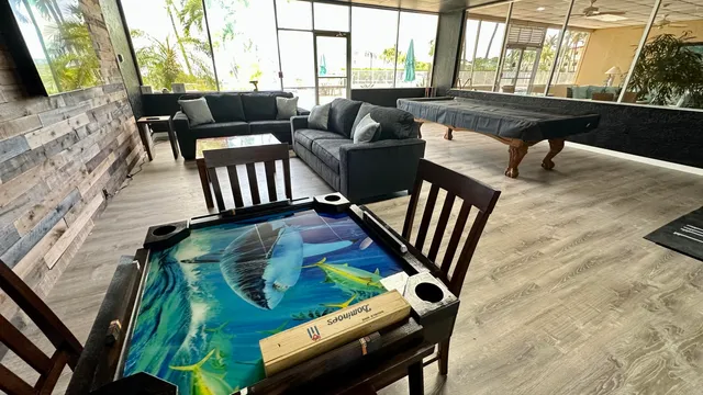 a living room with furniture fireplace and a flat screen tv