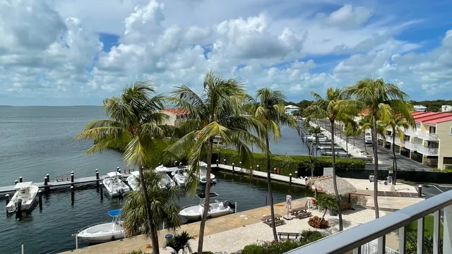 a view of swimming pool with outdoor seating