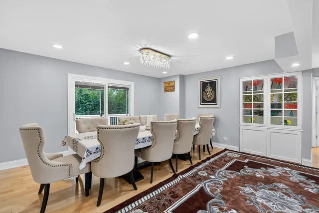a view of a dining room with furniture window and outside view
