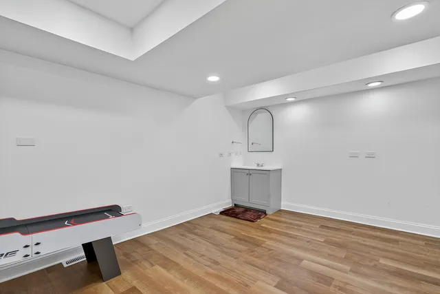 a bathroom with a shower and toilet