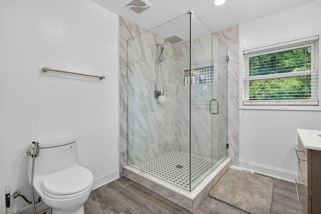 a bathroom with a sink a vanity and a mirror