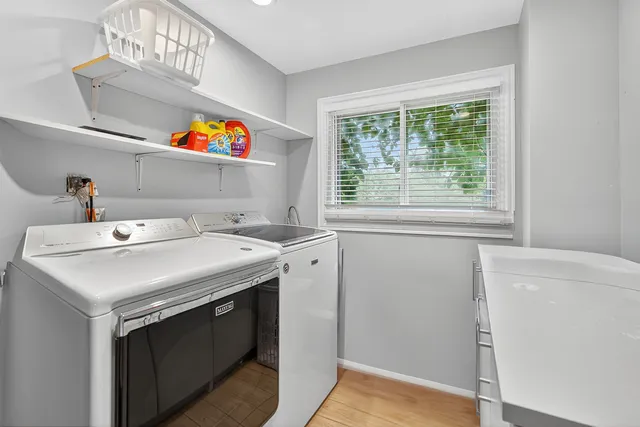 a room with furniture and a wooden floor