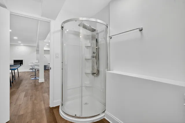 a view of balcony with wooden floor