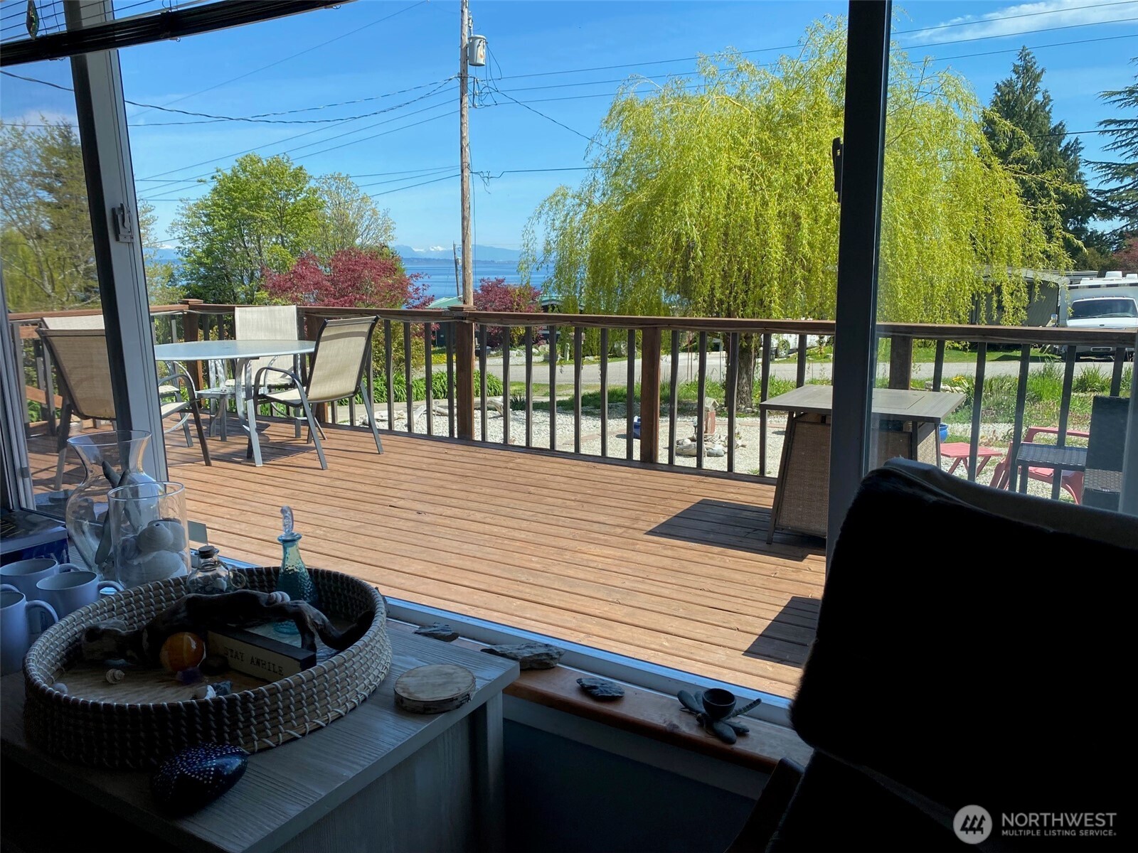 251 Elizabeth Drive Point Roberts, WA 98281 - Photo 4 of 15 a living room with furniture and a floor to ceiling window