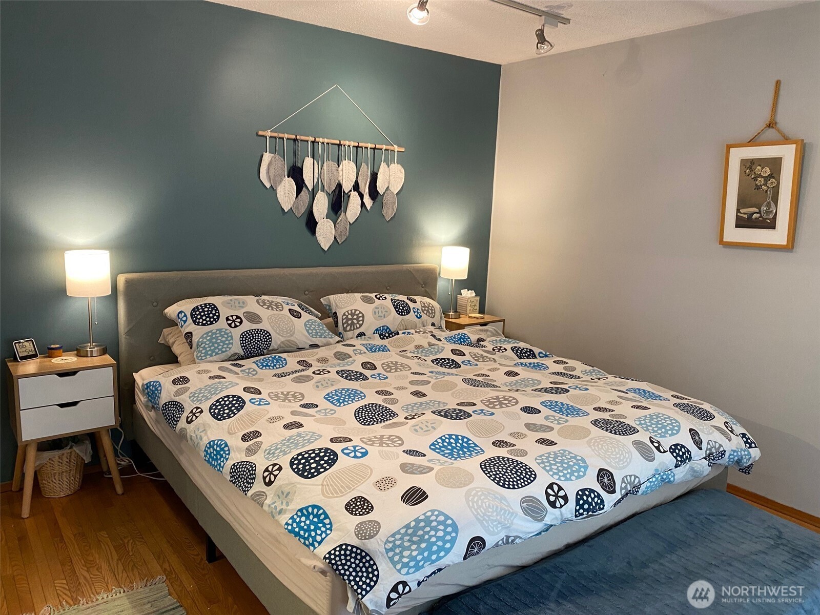 251 Elizabeth Drive Point Roberts, WA 98281 - Photo 10 of 15 a bedroom with a bed and a painting on the wall