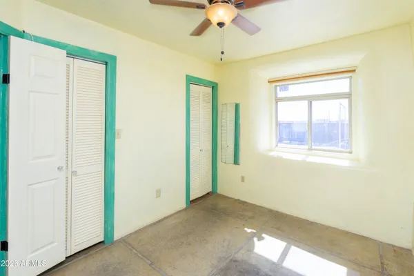 a view of a backyard with a patio