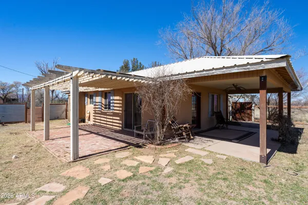 a bathroom with a mirror and a shower