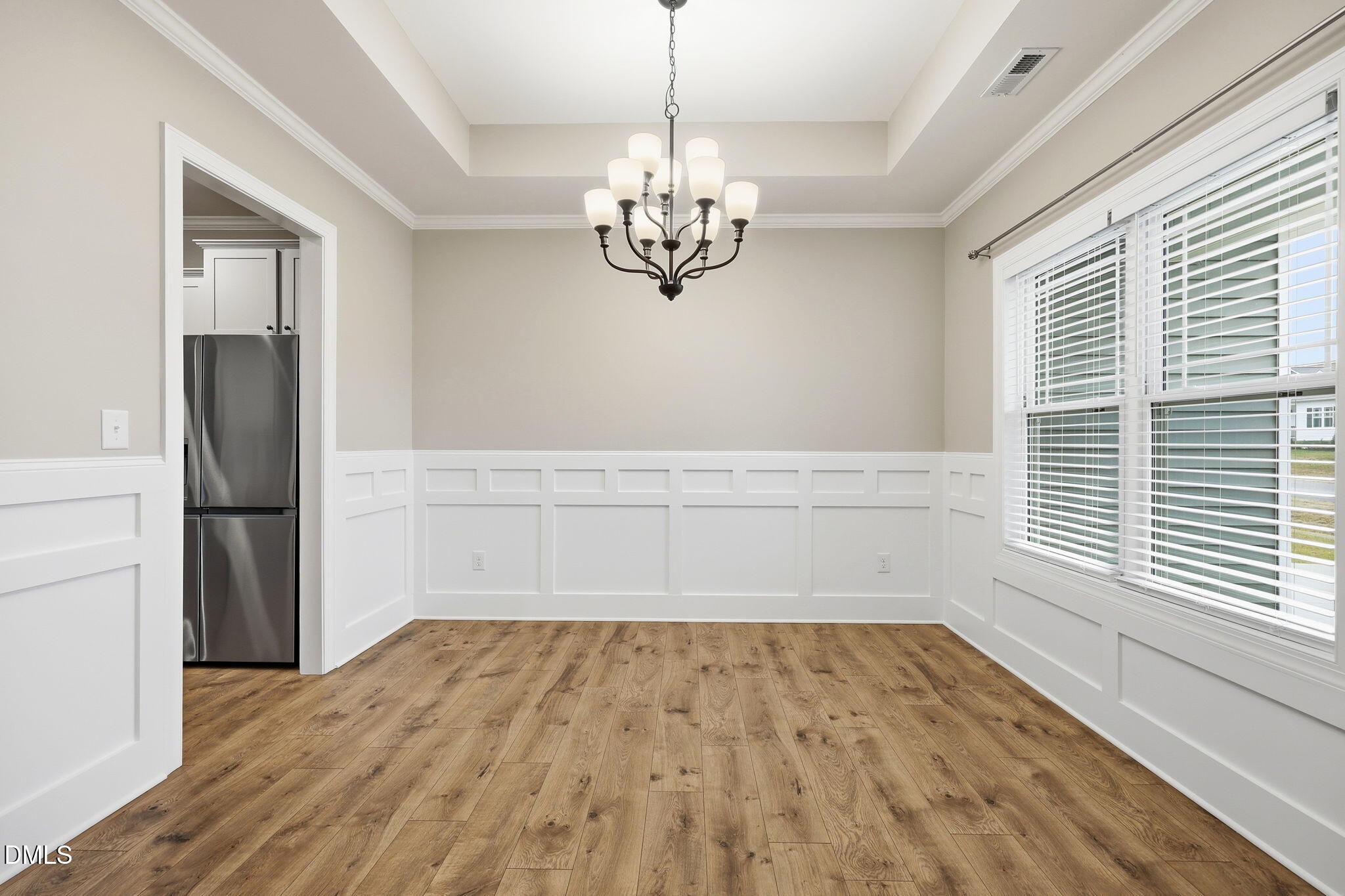 146 Seahawk Way Zebulon, NC 27597 - Photo 9 of 51 a view of empty room with wooden floor and fan