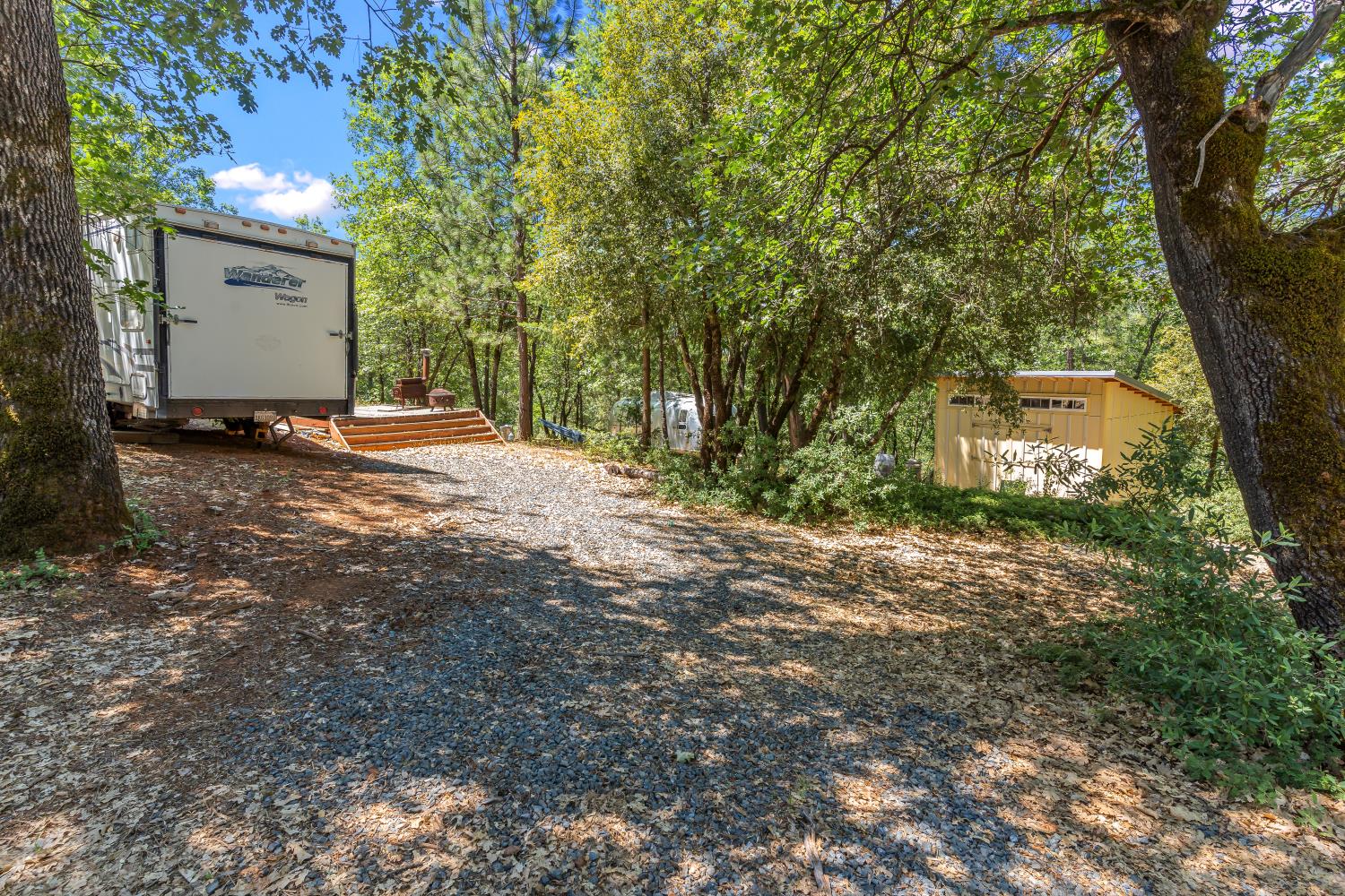 2640 Trail Gulch Road Placerville, CA 95667 - Photo 13 of 37 a view of a house with a tree and yard