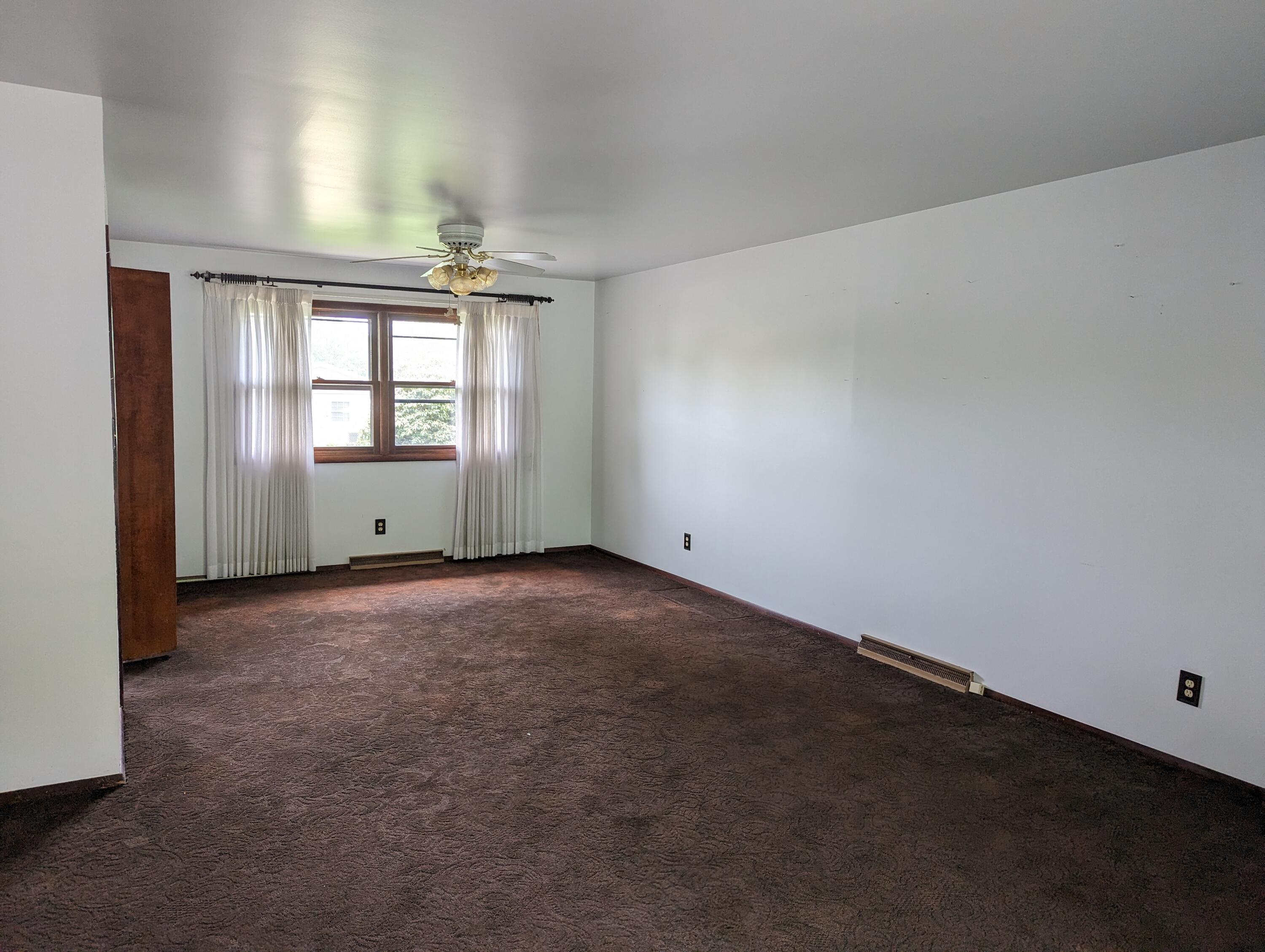 3732 Lexington Road Michigan City, IN 46360 - Photo 3 of 16 an empty room with windows and closet