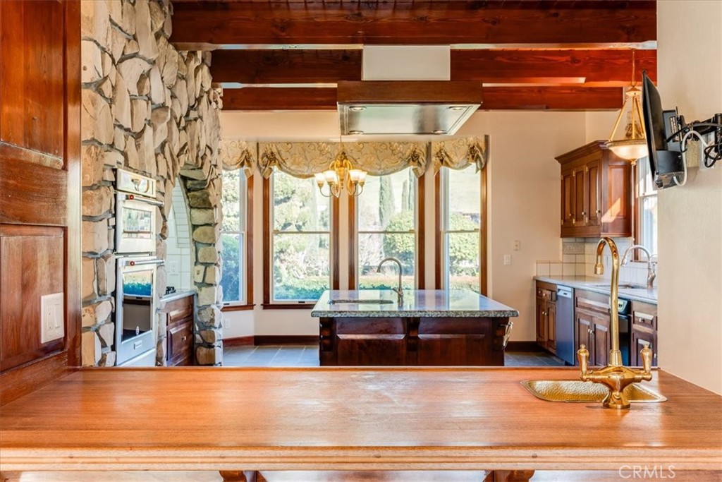 1655 Barley Grain Road Paso Robles, CA 93446 - Photo 14 of 50 This wet bar with mahogony countertop is open to the kitchen and family room