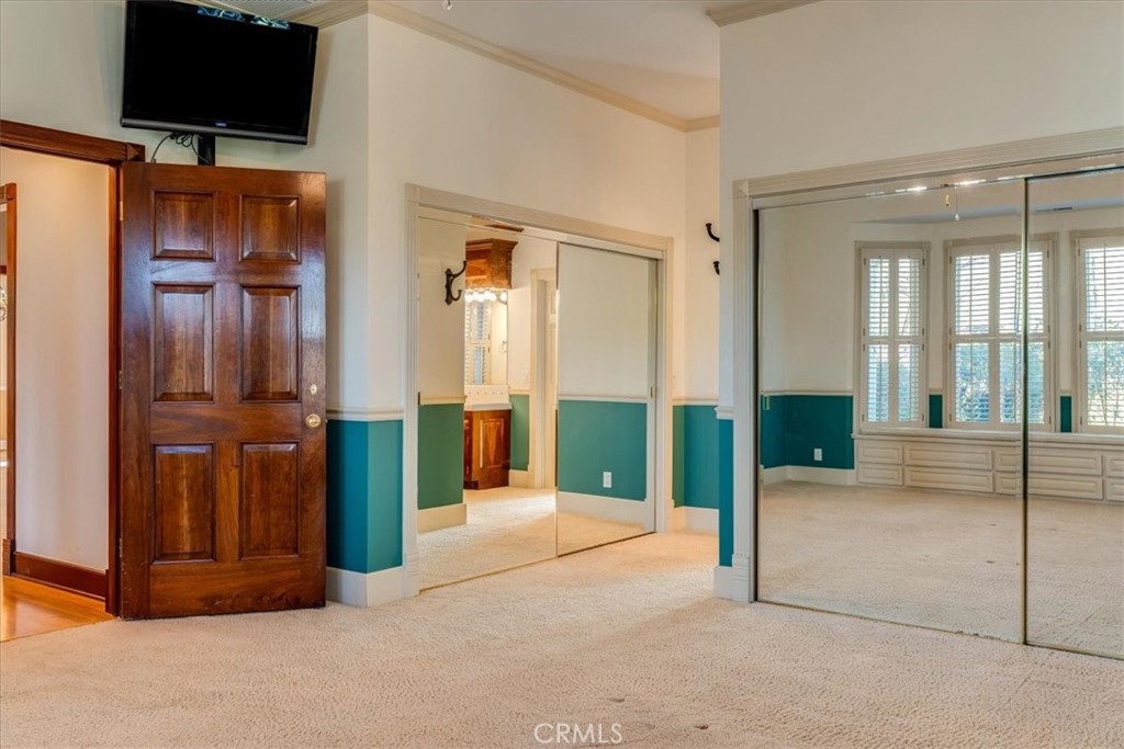 1655 Barley Grain Road Paso Robles, CA 93446 - Photo 25 of 50 2 mirrored closets in downstairs Primary bedroom