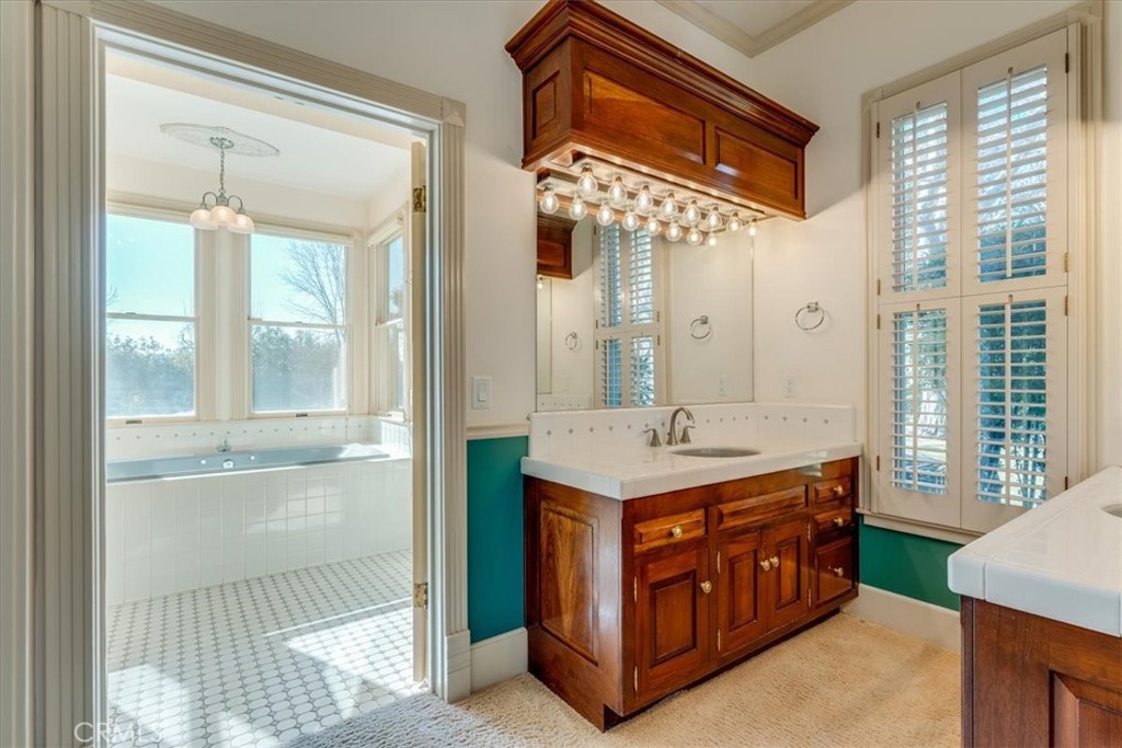 1655 Barley Grain Road Paso Robles, CA 93446 - Photo 28 of 62 Primary bathroom leading into the tub/shower room
