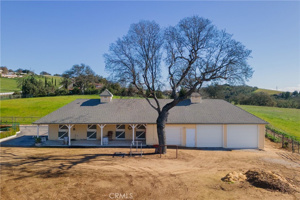 1655 Barley Grain Road Paso Robles, CA 93446 - Photo 41 of 50 4 stall barn, tack room with overhead door and a double deep garage allowing room for 4 vehicles