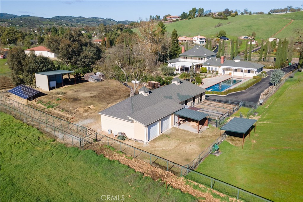 1655 Barley Grain Road Paso Robles, CA 93446 - Photo 46 of 62 4 stall barn, tack room and 4 vehicle garage, trailer shed, solar, chicken house and more