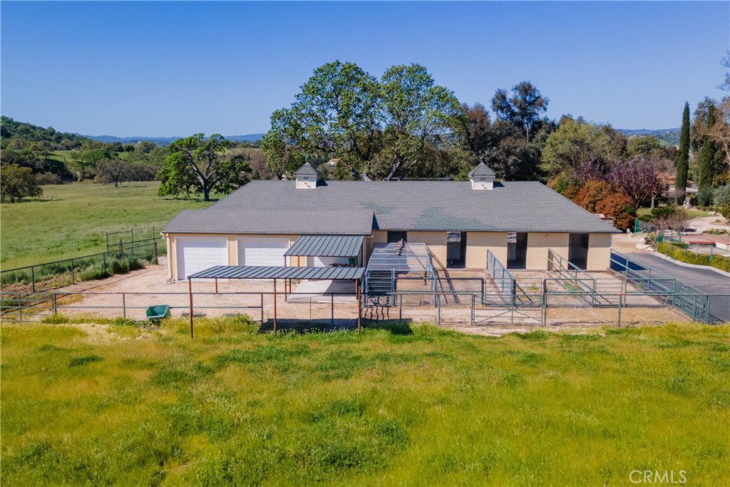 1655 Barley Grain Road Paso Robles, CA 93446 - Photo 47 of 62 Barn with stalls and turnouts and additional shelter in the pasture