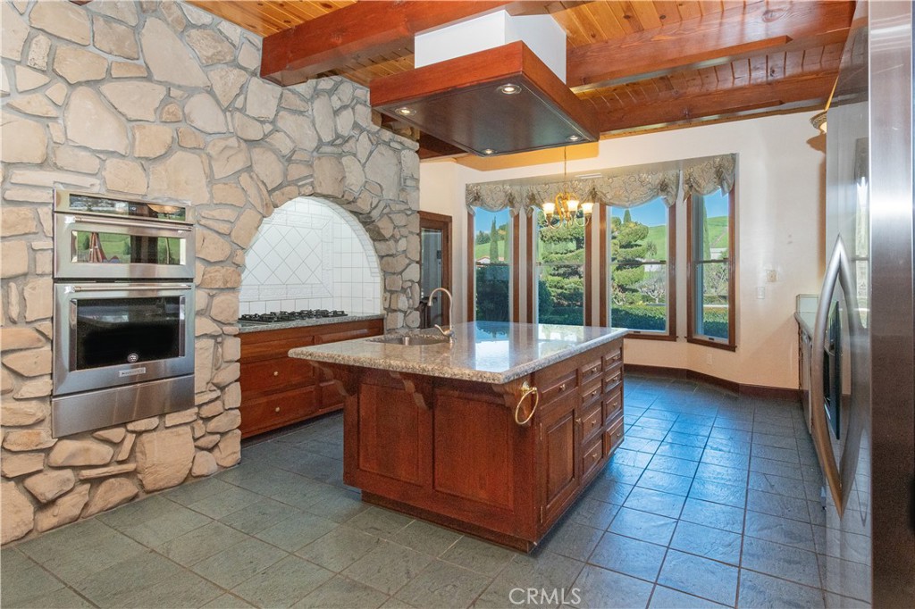 1655 Barley Grain Road Paso Robles, CA 93446 - Photo 9 of 50 Looking into the cooking area with tile surround and native rock accent