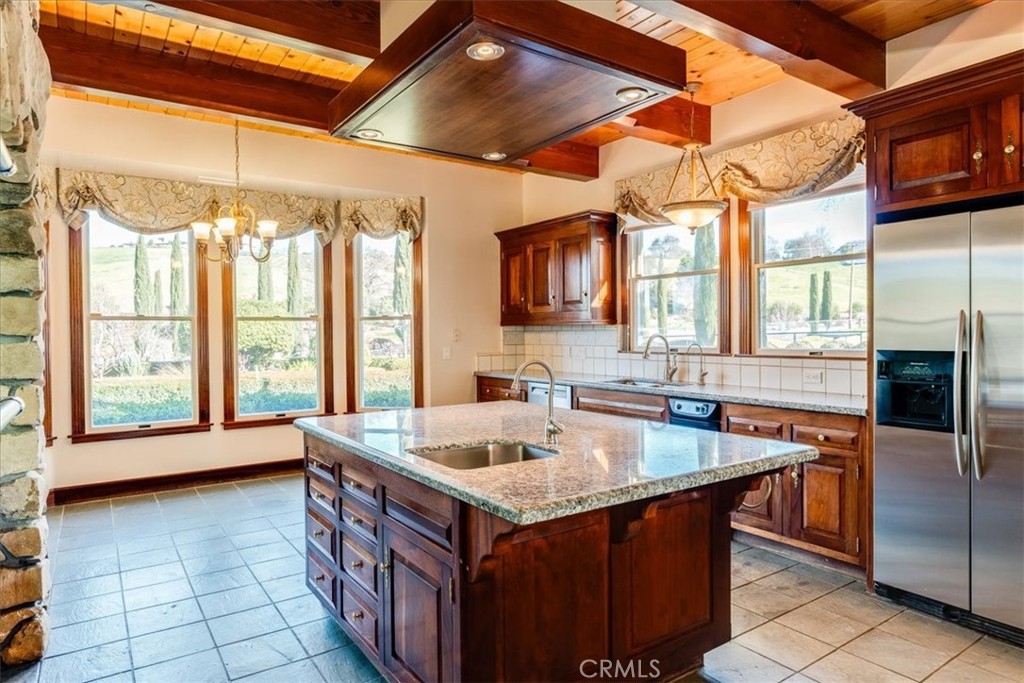 1655 Barley Grain Road Paso Robles, CA 93446 - Photo 9 of 62 Granite topped kitchen with mahogany cabinetry and Virginia slate flooring